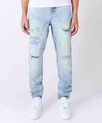 Ripped And Repaired Washed Denim Jeans - Light Blue