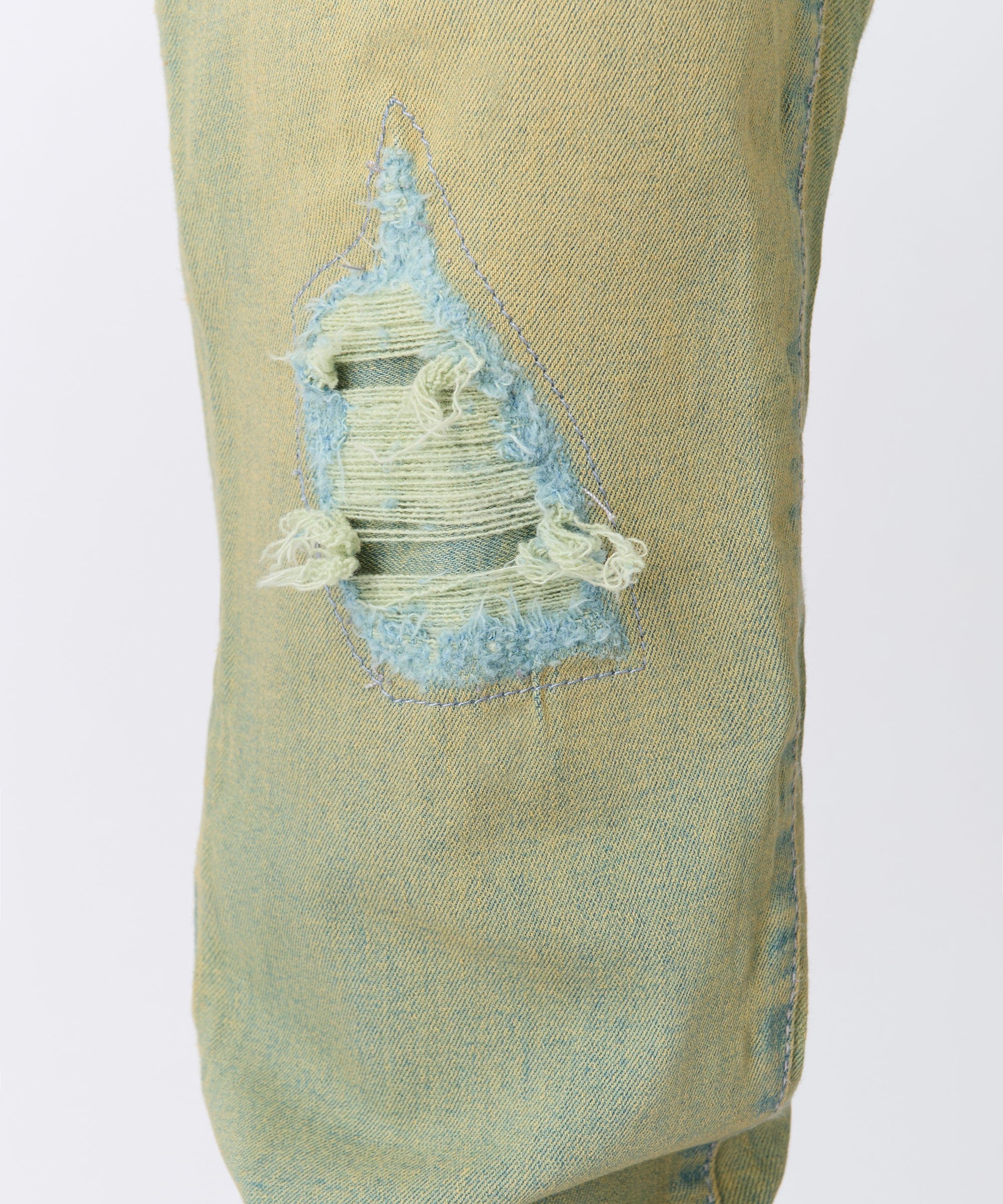 Ripped And Repaired Denim Pants - Vintage Blue